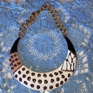 NECKLACE, goldtone chain w/tan, brown, blk & wh. animal design $29